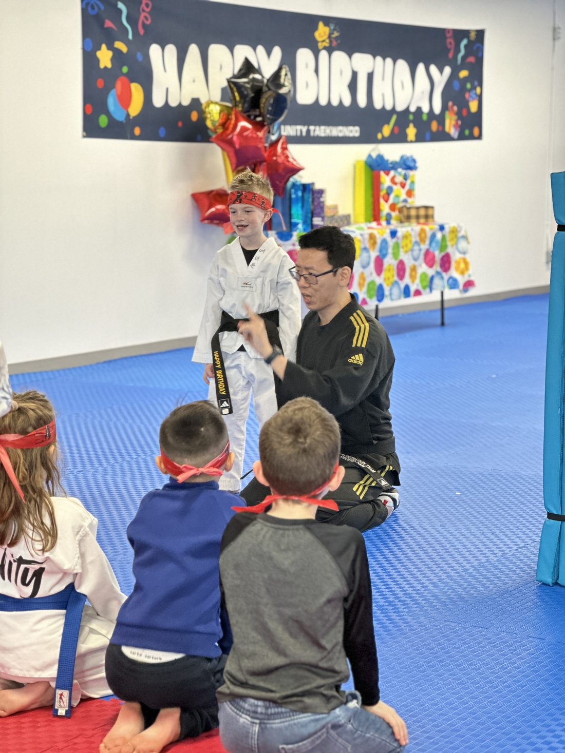 Master Nam leading a birthday party at Unity Taekwondo in Chilliwack