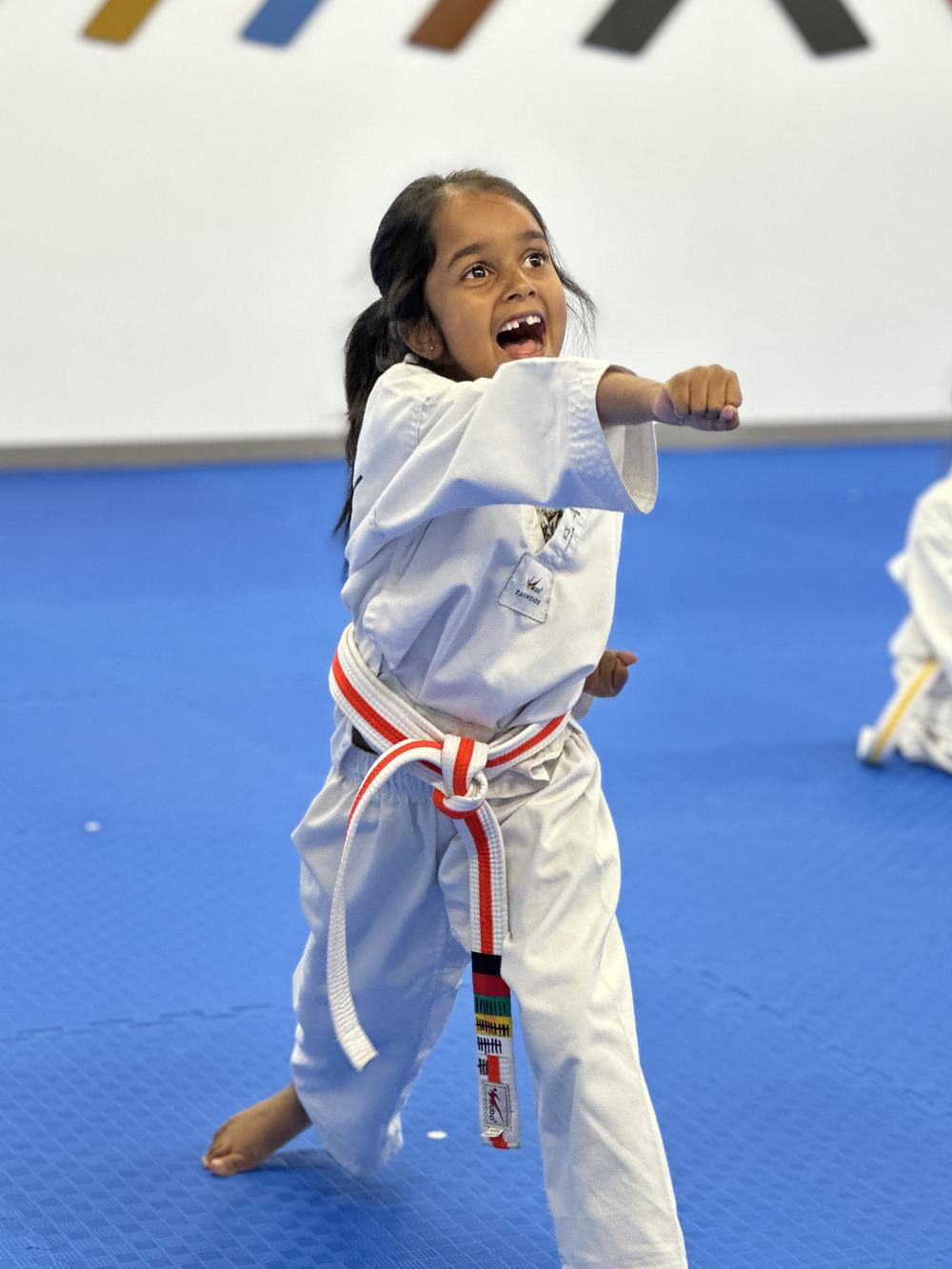 Lithumi punching at Unity Taekwondo in Chilliwack